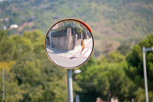 Φωτογραφία Close up traffic convex mirror, road safety concept