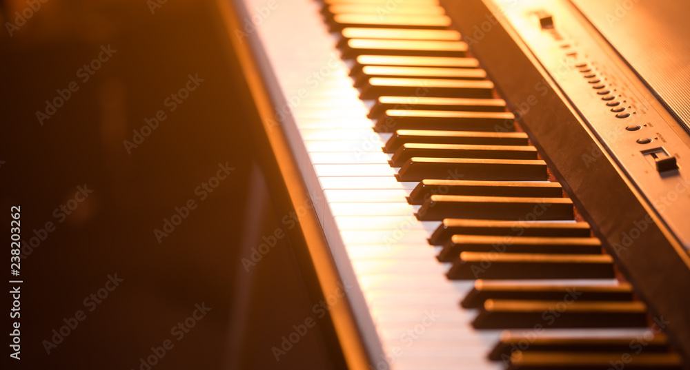 piano keys close-up, on a beautiful colored background piano keys close-up, on a beautiful colored background
