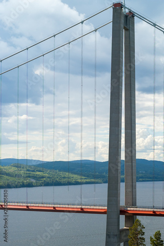 Vertical view of the towers (or pylons) and suspender cables of the longest suspension bridge in Sweden,The High Coast Bridge. Photo taken July 2017.
