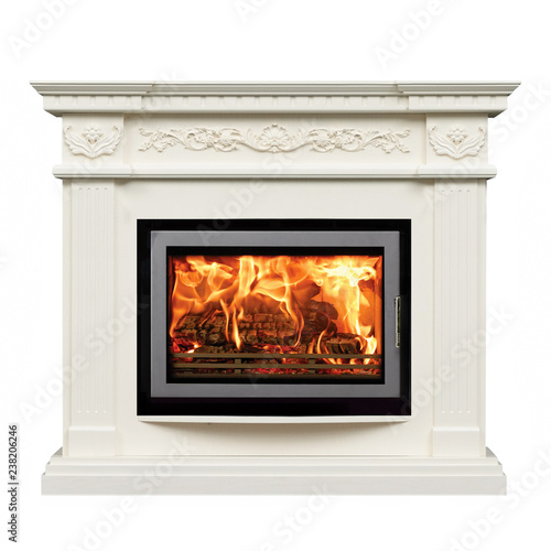 Burning classic fireplace of white marble. Isolated on white