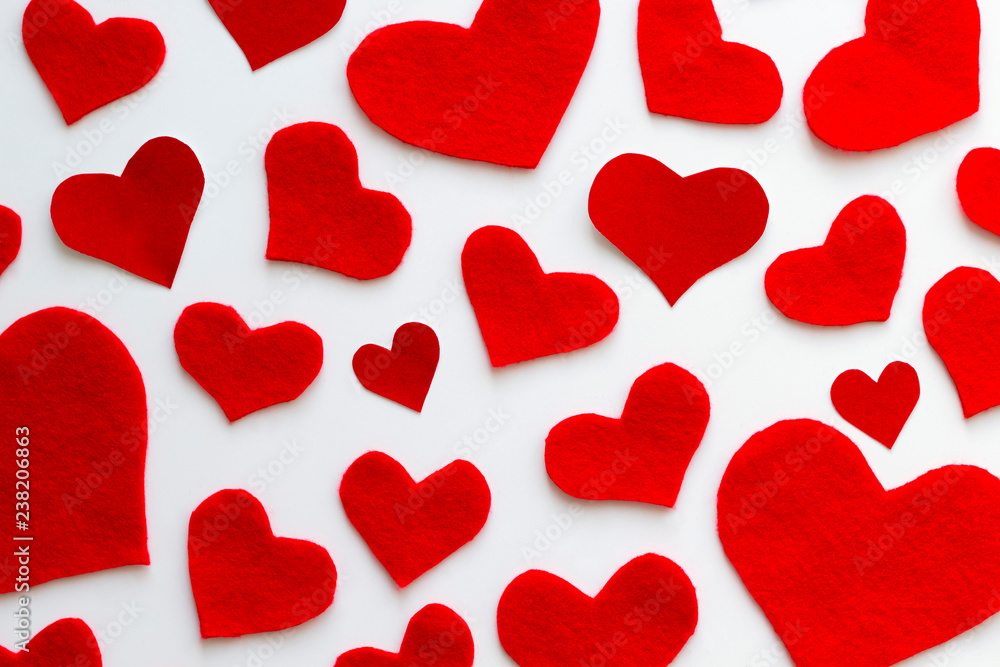 Background from red felt hearts. Valentine's Day concept. Top view Background from red felt hearts. Valentine's Day concept. Top view