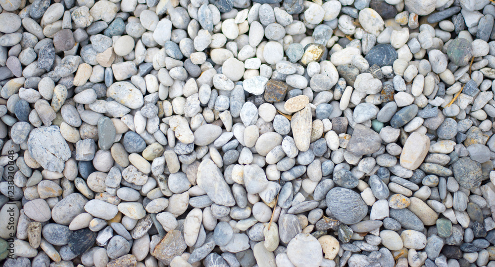 Pebbles from many different natural stones. Pebbles from many different natural stones.