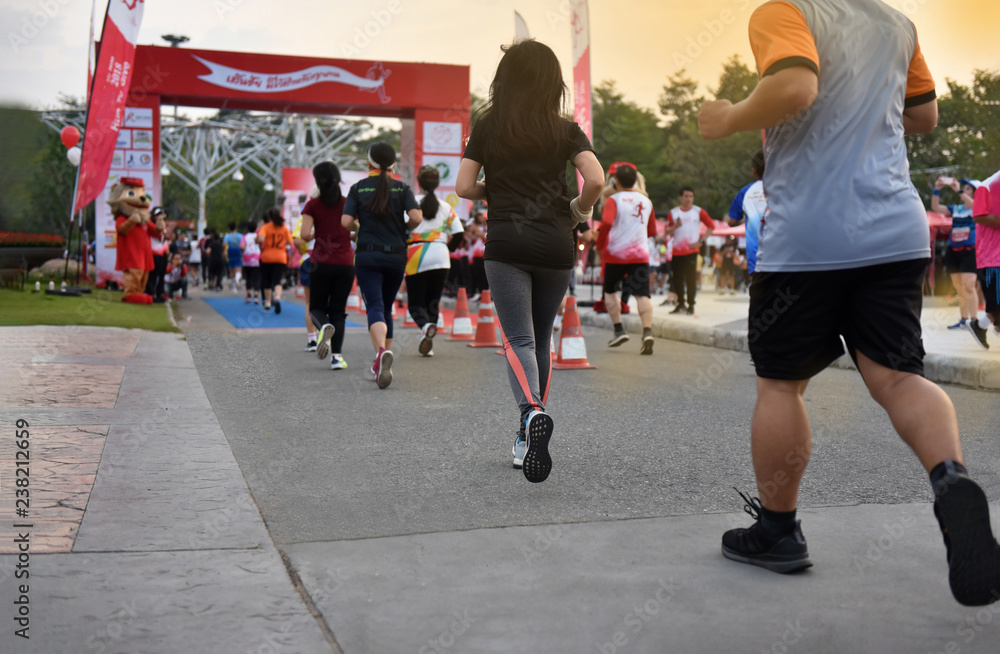 Lots of People running in ChiangMai Marathon at Royal Park. The runners