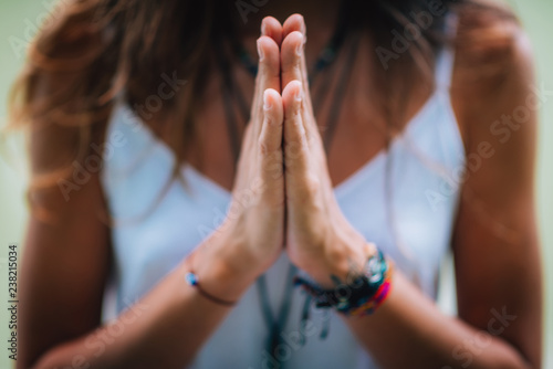 Mindfulness and Meditation. Yoga Woman. Hands in Prayer Position. photo