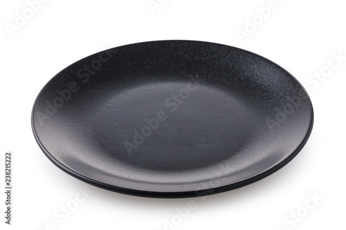 Bild auf Leinwand Black empty ceramic plate, side view of an isolated object