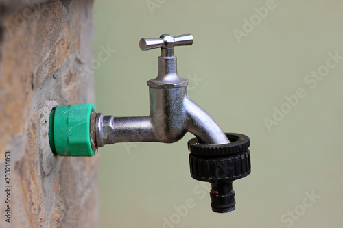 Garden water tap faucet metal detail close up