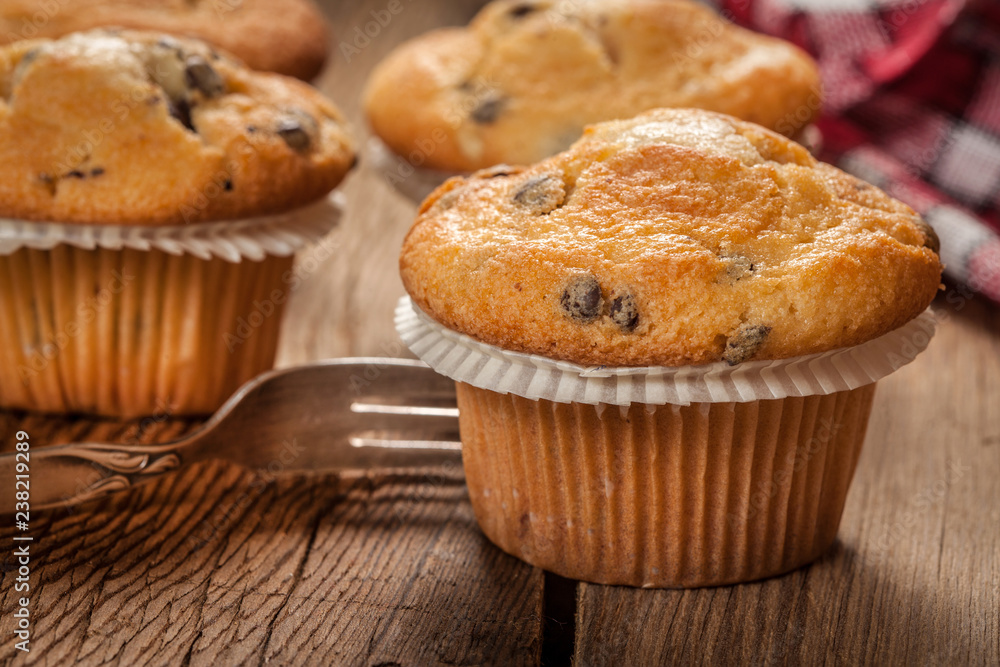 Tasty muffins on wooden boards Tasty muffins on wooden boards