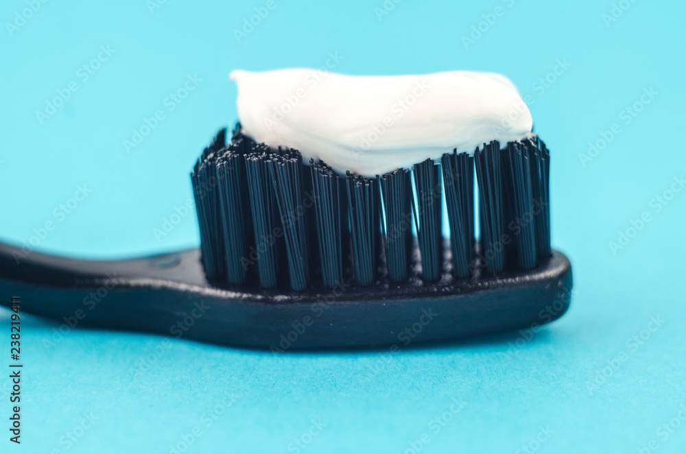 Toothbrushes on blue background. Copy space for text Toothbrushes on blue background. Copy space for text