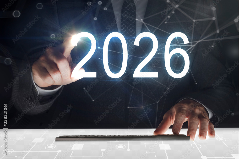 Business man touching screen with "2026" writing - obrazy, fototapety, plakaty 