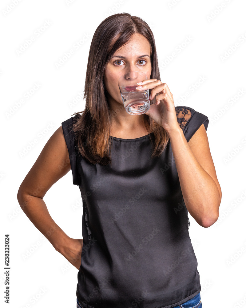 young woman drinking a glass of water isolated on a white background young woman drinking a glass of water isolated on a white background