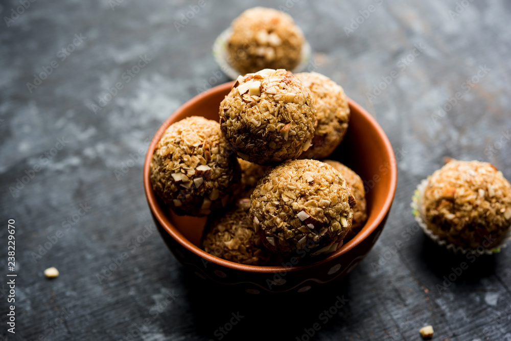 Oats laddu or Ladoo also known as Protein Energy balls. served in a plate or bowl. selective focus Oats laddu or Ladoo also known as Protein Energy balls. served in a plate or bowl. selective focus