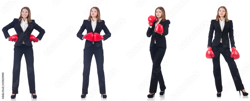 Obraz premium Businesswoman with boxing gloves isolated on white 