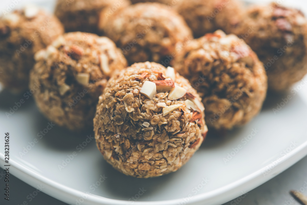 Oats laddu or Ladoo also known as Protein Energy balls. served in a plate or bowl. selective focus Oats laddu or Ladoo also known as Protein Energy balls. served in a plate or bowl. selective focus