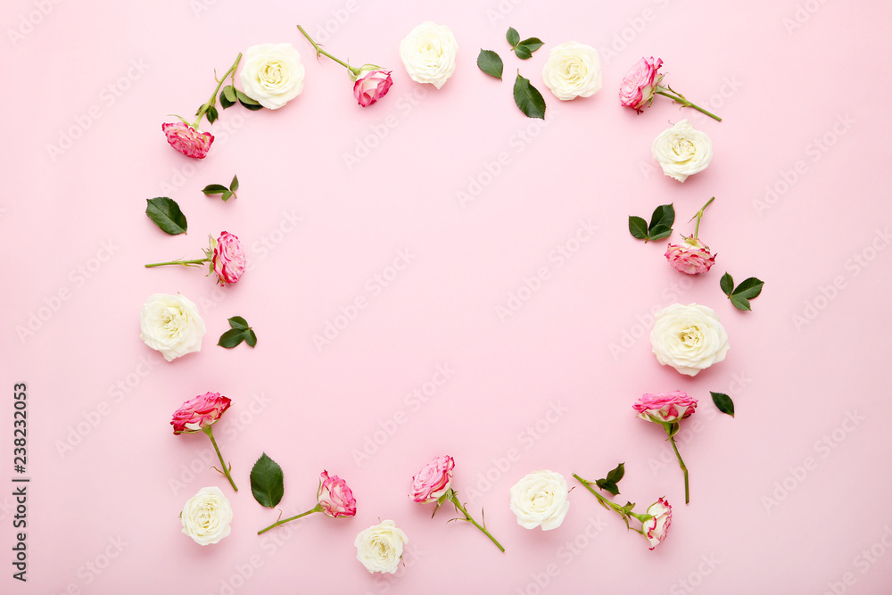 Rose flowers with green leafs on pink background