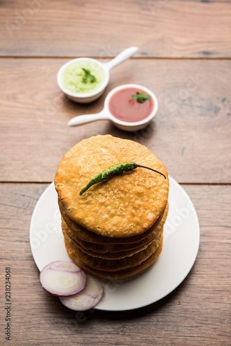 Shegaon or Rajasthani Kachori served with green Chutney and tomato ketchup photo