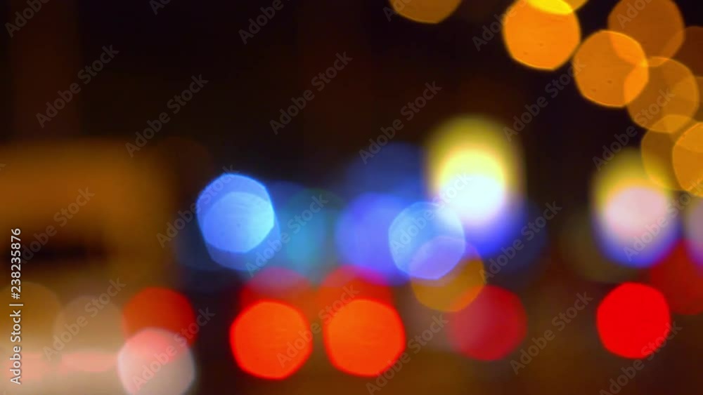 Defocused street lights. Multicolored bokeh. Defocused street lights. Multicolored bokeh.