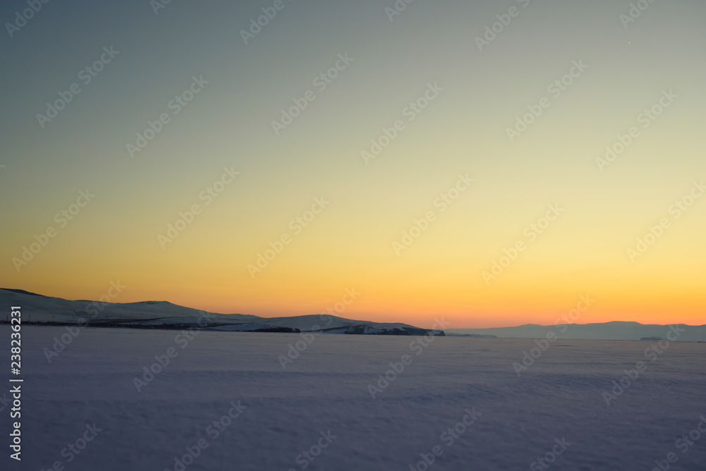 sunset in the vast expanses of Lake Baikal on Olkhon Island