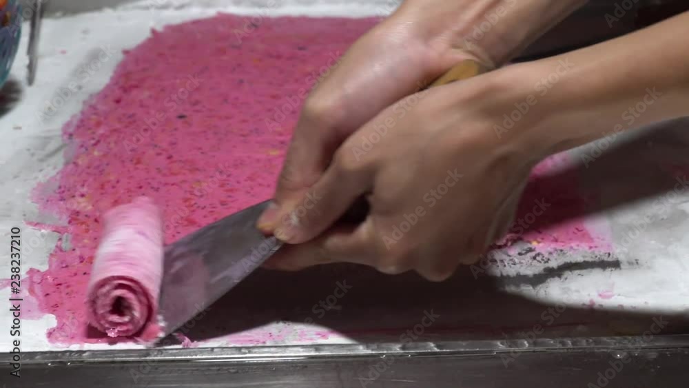 Vietnamese stir-fried ice-cream from milk and fresh strawberry and other fruits. Vietnamese stir-fried ice-cream from milk and fresh strawberry and other fruits.