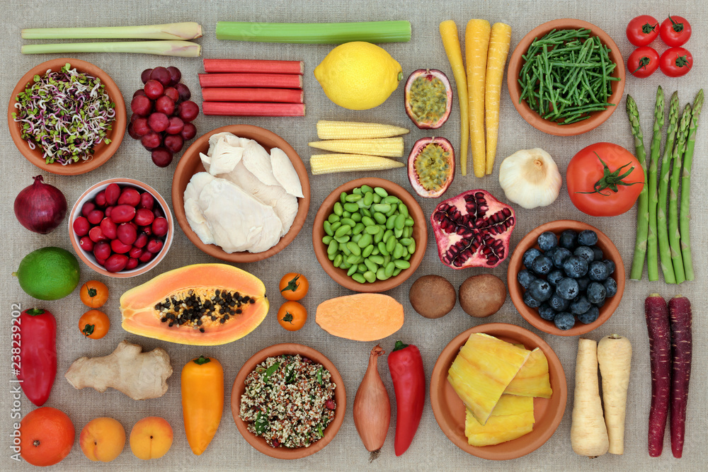 Super food for fitness concept with chicken, fish, grain mix, fruit, vegetables, herbs and spice. Foods high in antioxidants, protein, anthocyanins, dietary fibre and vitamins. Top view. Super food for fitness concept with chicken, fish, grain mix, fruit, vegetables, herbs and spice. Foods high in antioxidants, protein, anthocyanins, dietary fibre and vitamins. Top view.