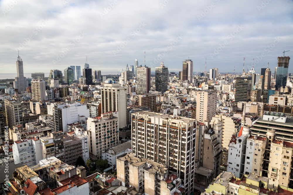 Obraz premium Buenos Aires Central Business District (Microcentro) skyscrapers skyline in winter under cloudy lead sky. Argentina, South, Latin America aerial view.
