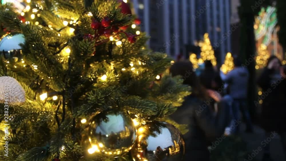 People on Christmas market near Red Square and State Duma in Moscow. People take photo and have fun,shimmering lights on blurry background People on Christmas market near Red Square and State Duma in Moscow. People take photo and have fun,shimmering lights on blurry background