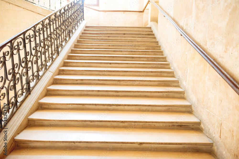Marble staircase with stairs in luxury hall Marble staircase with stairs in luxury hall