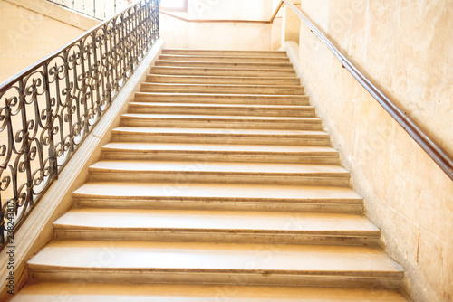 Marble staircase with stairs in luxury hall