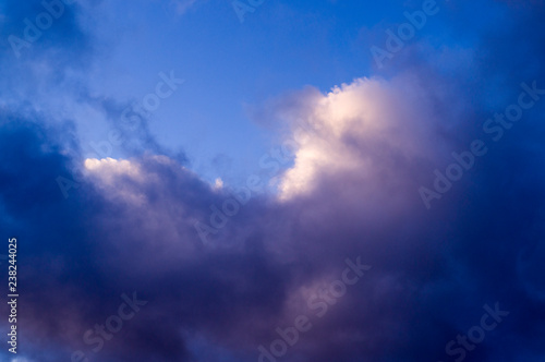 blue evening sky with white and gray clouds  cumulus. background  nature © Timofey
