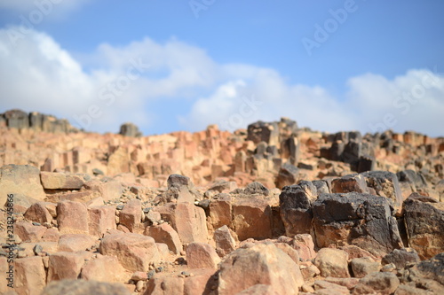Natural rocks at bottom of Makhtesh Ramon Crater, Mitzpe Ramon, Negev desert, Israel