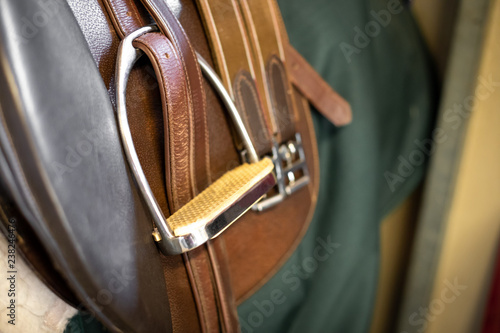 Close up on the foot stirrup of a horse riding saddle