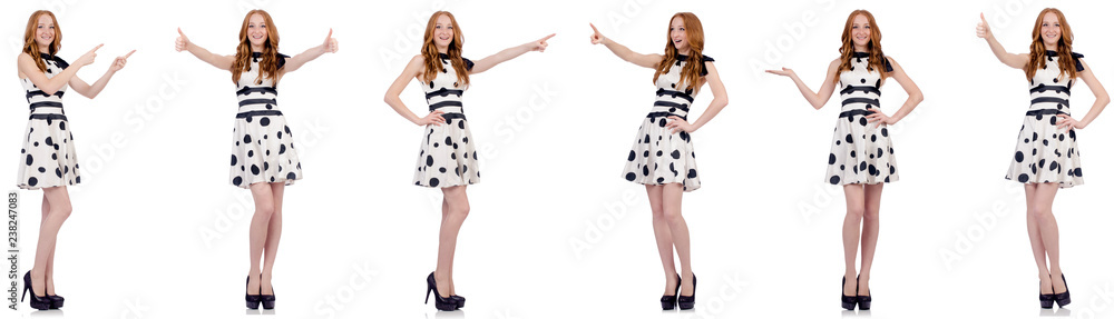 Young woman in polka dot dress isolated on white Young woman in polka dot dress isolated on white