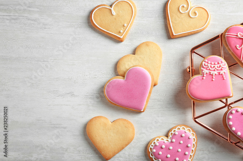 Canvas-taulu Flat lay composition with decorated heart shaped cookies and space for text on t