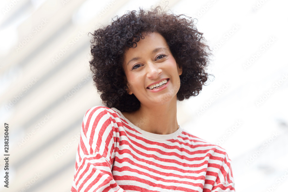 Fototapeta premium Close up older african american woman smiling outdoors
