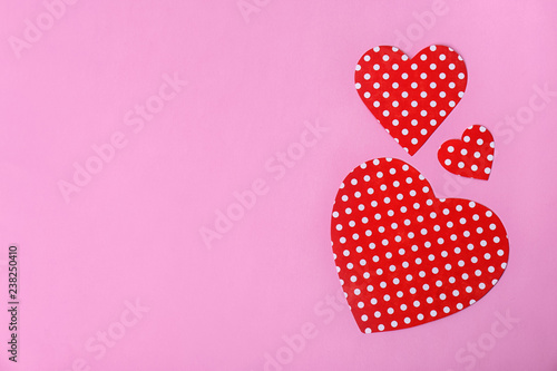 Paper hearts and space for text on color background  top view
