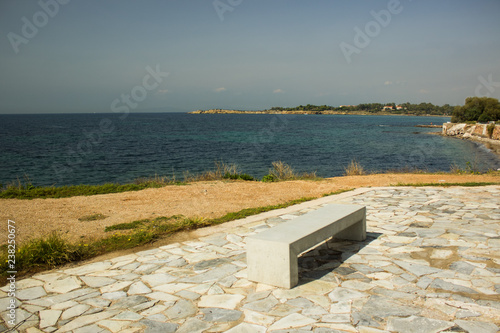 marble stone bench architecture object exterior landscape design on outdoor Aegean sea sand shore waterfront line district for rest and walking 