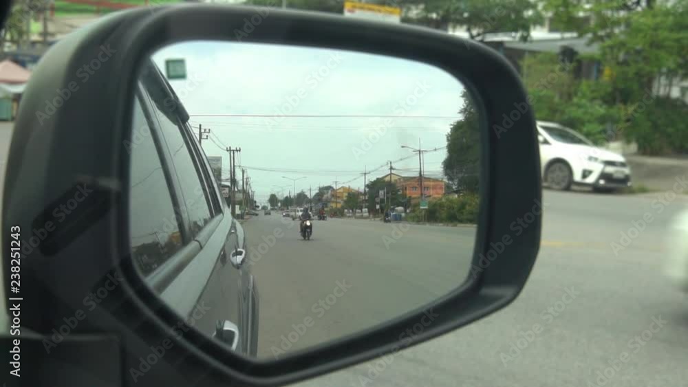 Cars traffic jam on the road view from mirror side of car. Cars traffic jam on the road view from mirror side of car.