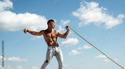 Achieving Ambition in Sport. Strong Man Pull Rope. Sport Man Develop  Muscular Hand Strength Stock Photo - Image of fitness, bodycare: 139956852