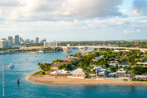 Ft Lauderdale landscape with small beach and bridge at Port Everglades. photo