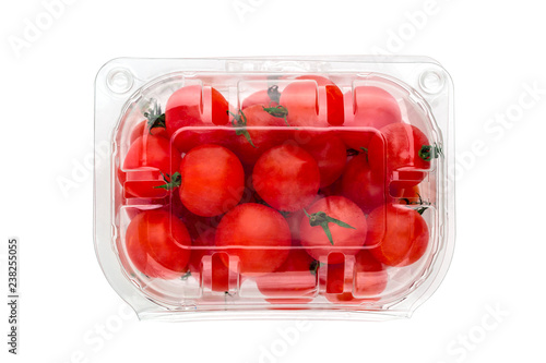 Cherry tomatoes in a plastic container. Fresh cherry tomatoes in box on white background.