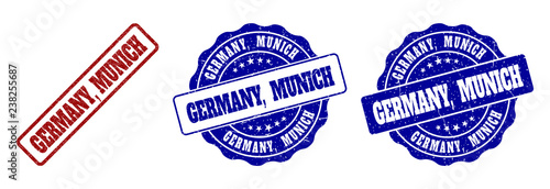 GERMANY, MUNICH grunge stamp seals in red and blue colors. Vector GERMANY, MUNICH watermarks with grunge effect. Graphic elements are rounded rectangles, rosettes, circles and text labels.