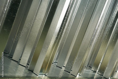 Hot dip galvanizing of metal constructions in bath with hot zinc, close-up