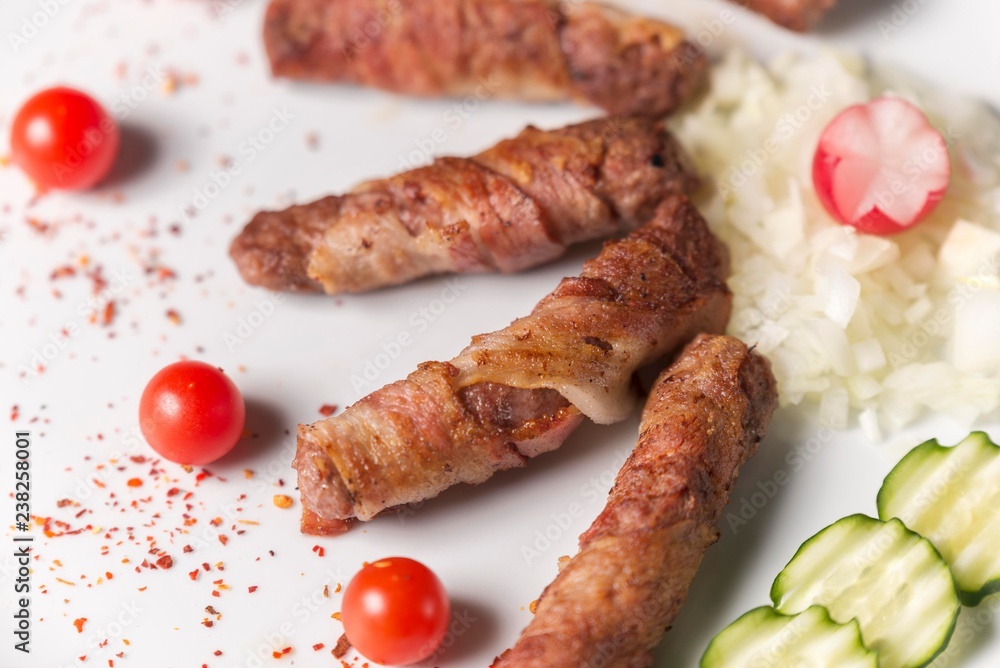 kebab meal on white plate with cherry tomato. fresh fast food meal. kebab meal on white plate with cherry tomato. fresh fast food meal.
