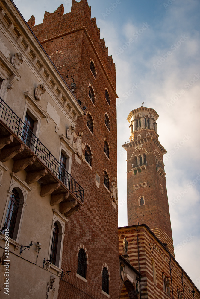 View of the Lamberti tower in Verona. Piazza delle Erbe. Tourist Destination In Veneto Region Of Italy