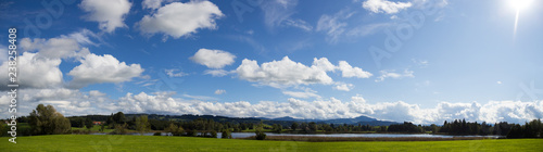 allgäu landscape with river and blue sky