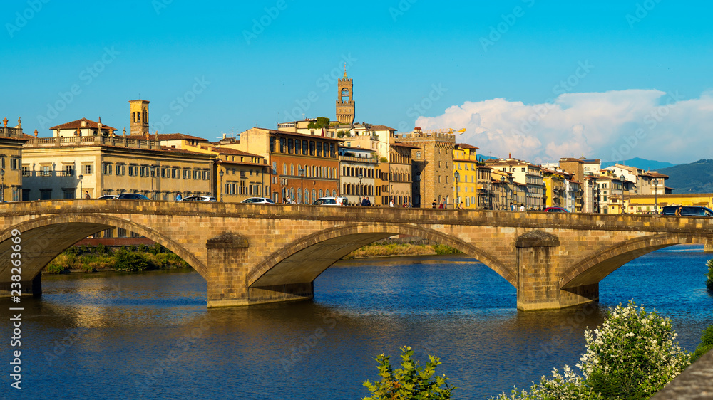 Florence, Tuscany, Italy — 21 June 2018. View of Arno river and St Trinity Bridge