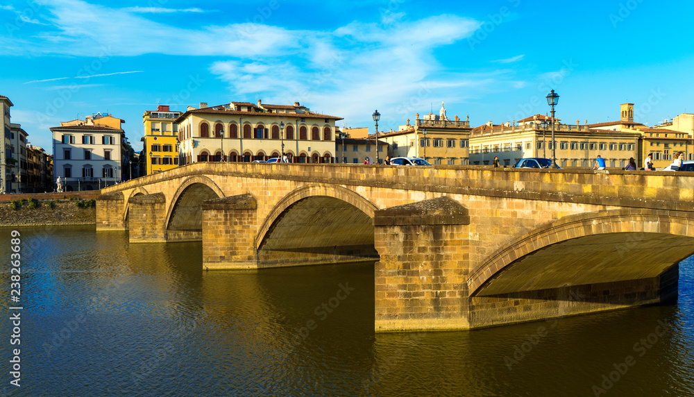 Florence, Tuscany, Italy — 21 June 2018. View of Arno river and St Trinity Bridge