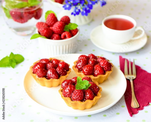 Homemade tartlets with raspberries fruits