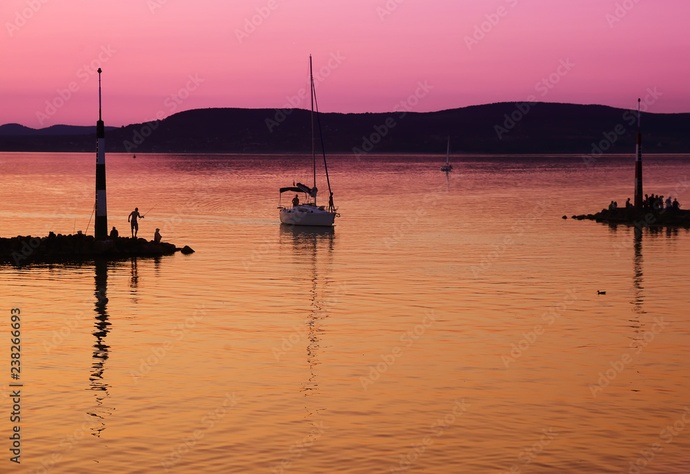 Sailing boats on Lake Balaton at sunset