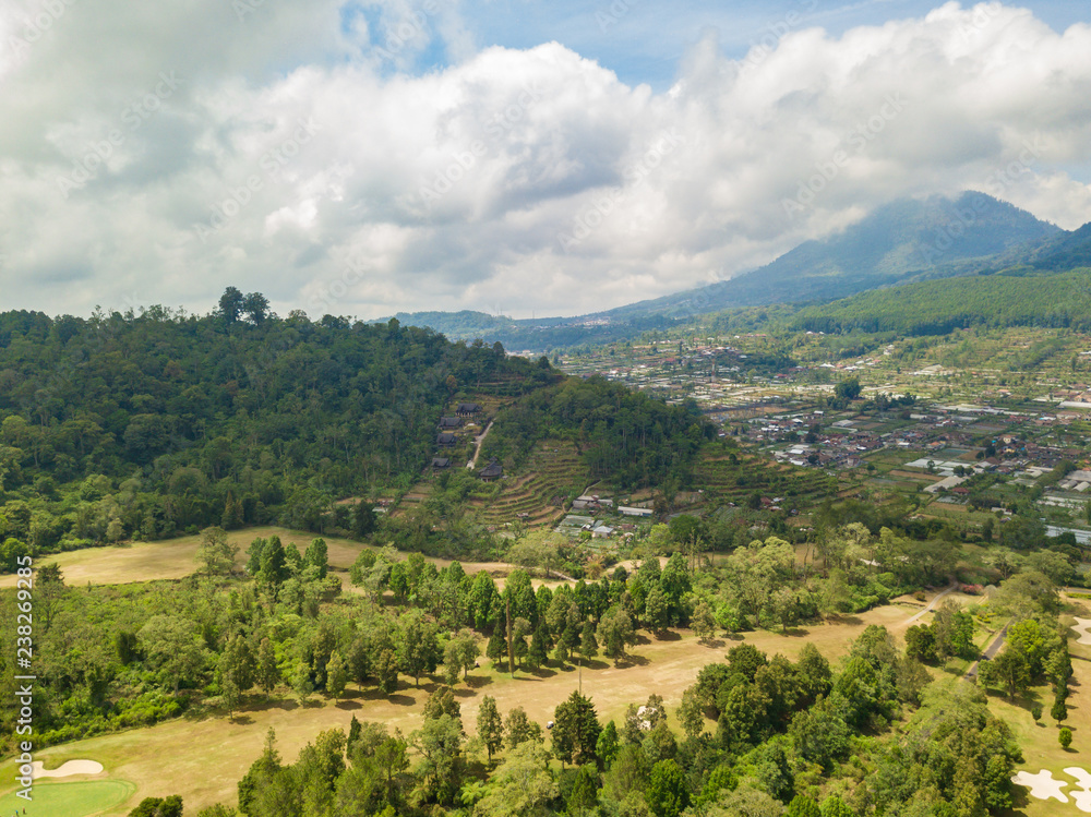 Green Bali landscape. Aerial drone view to Bedugul village. Indonesia.