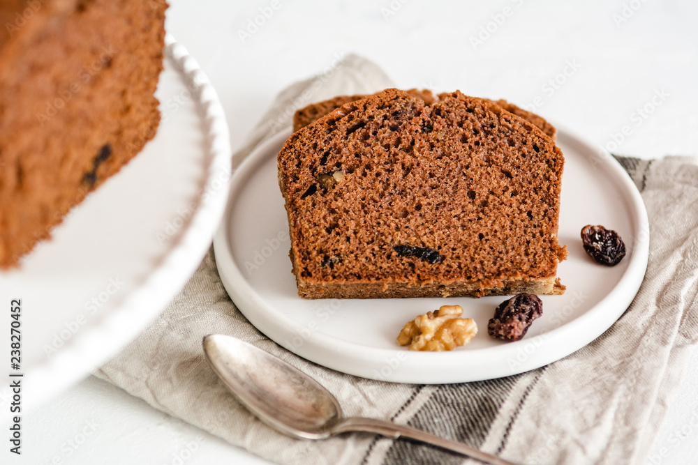 Homemade gingerbread cake on white plate. Honey cake. Homemade gingerbread cake on white plate. Honey cake.